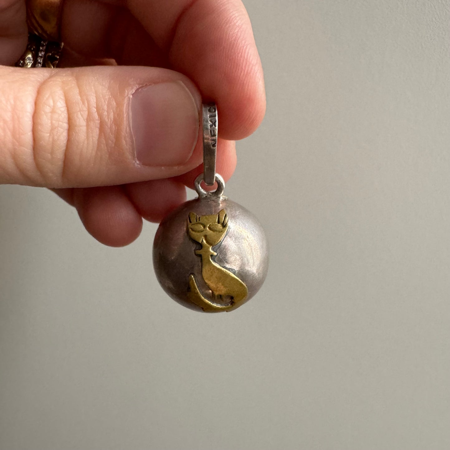 V I N T A G E // sterling silver and brass sassy cat chime charm orb pendant