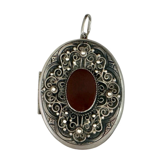 V I N T A G E // ornate memory keeper / sterling silver locket with carnelian stone