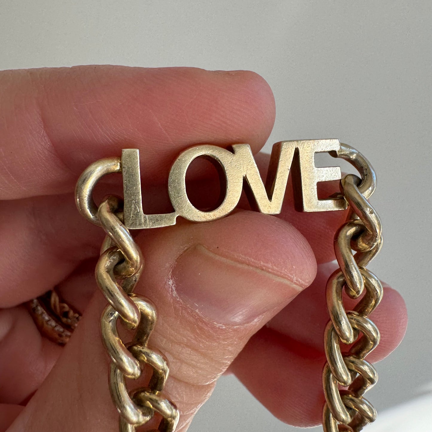 P R E - L O V E D // linked up LOVE / sterling silver and gold vermeil curb link LOVE bracelet / 7", 15g