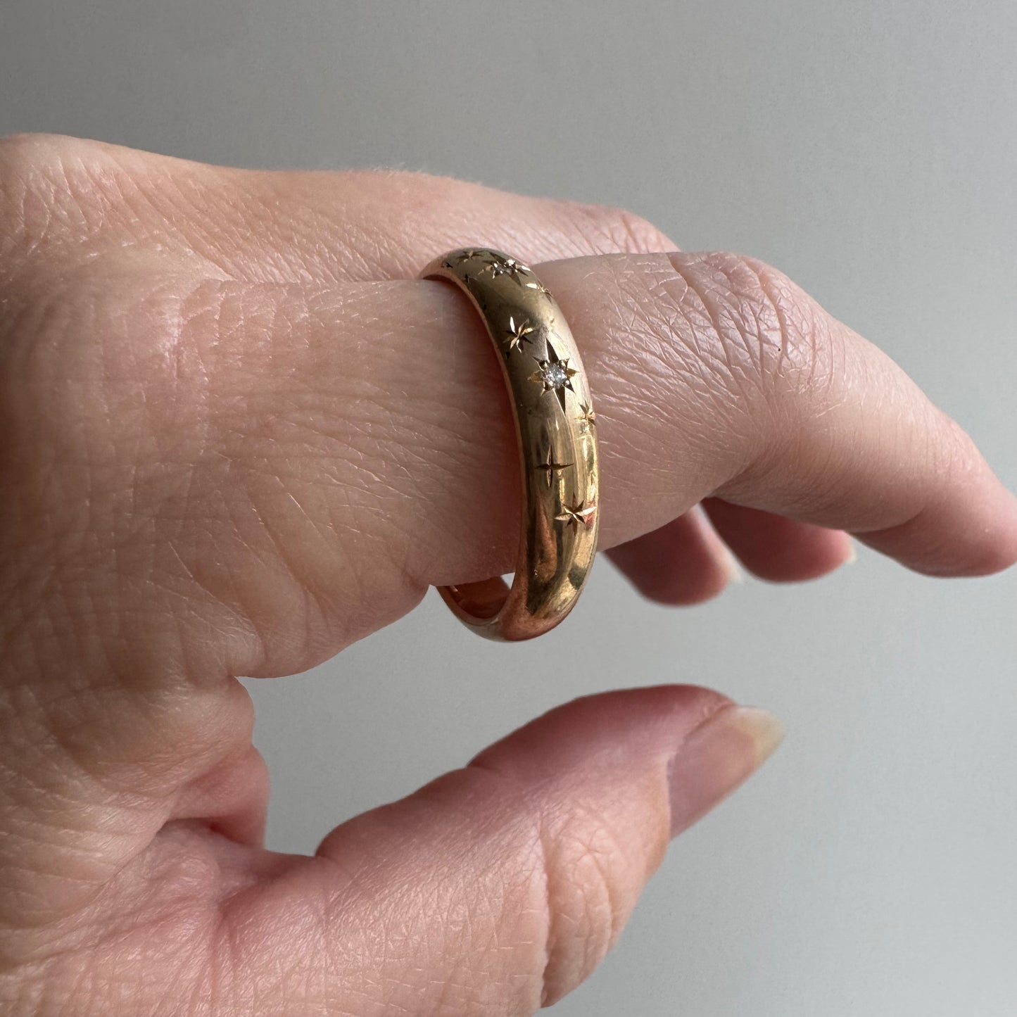 reimagined V I N T A G E // star story / 14k donut band with three new star-set diamonds and engraved starbursts / size 11 to 11.5