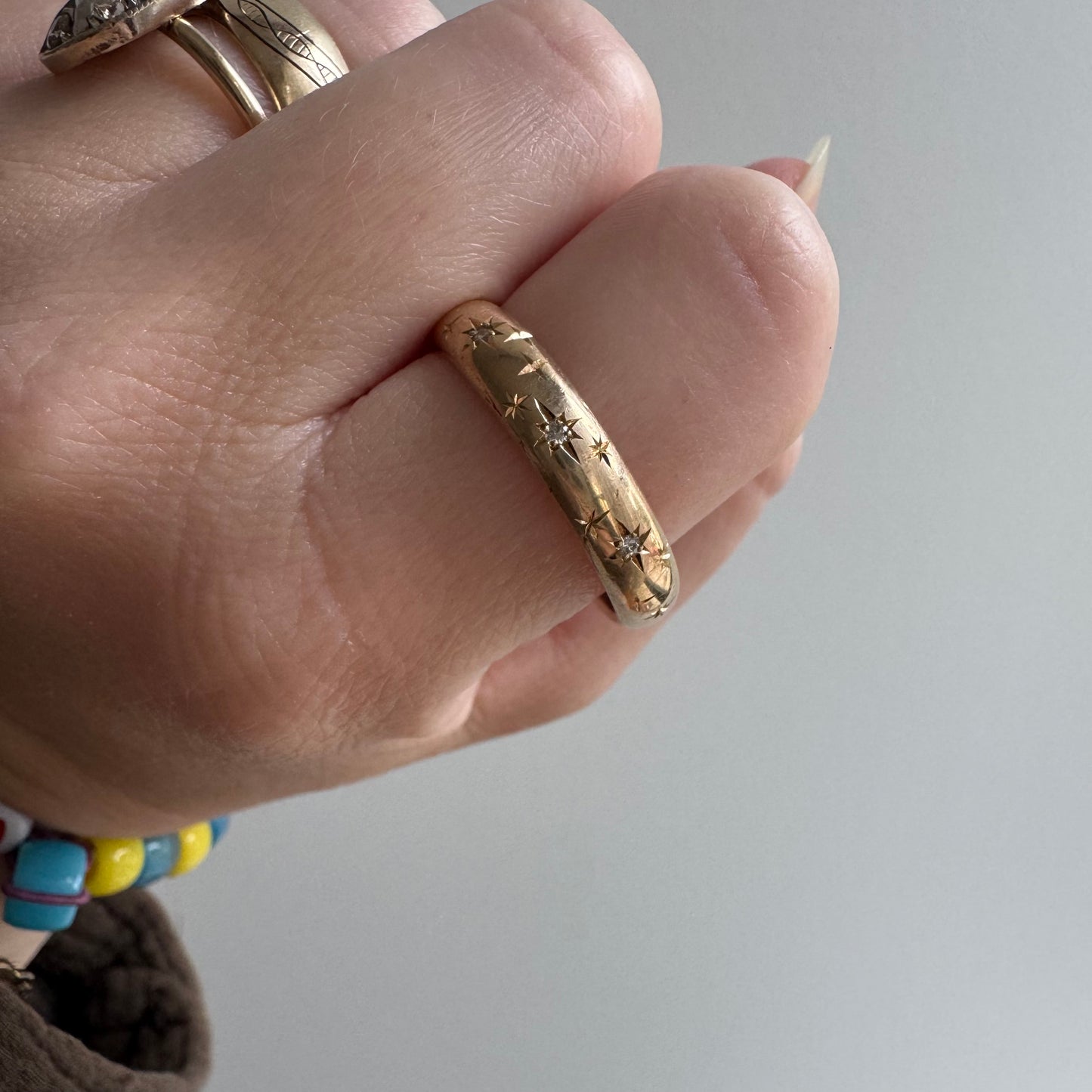 reimagined V I N T A G E // star story / 14k donut band with three new star-set diamonds and engraved starbursts / size 11 to 11.5