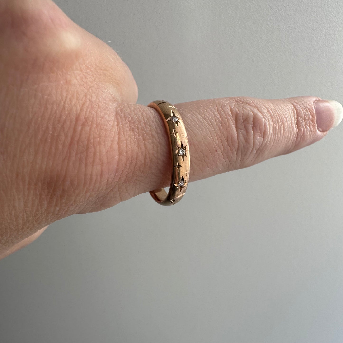 reimagined A N T I Q U E // star story / 14k donut band with three new star-set diamonds and engraved starbursts / size 10