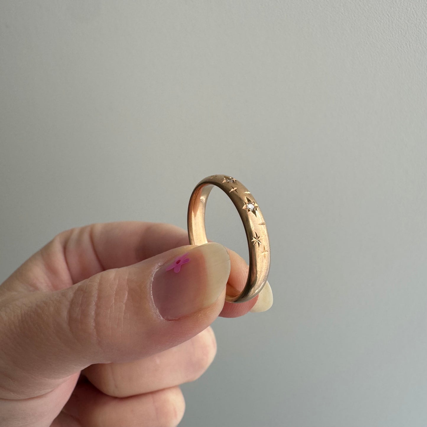 reimagined A N T I Q U E // star story / 14k donut band with three new star-set diamonds and engraved starbursts / size 10