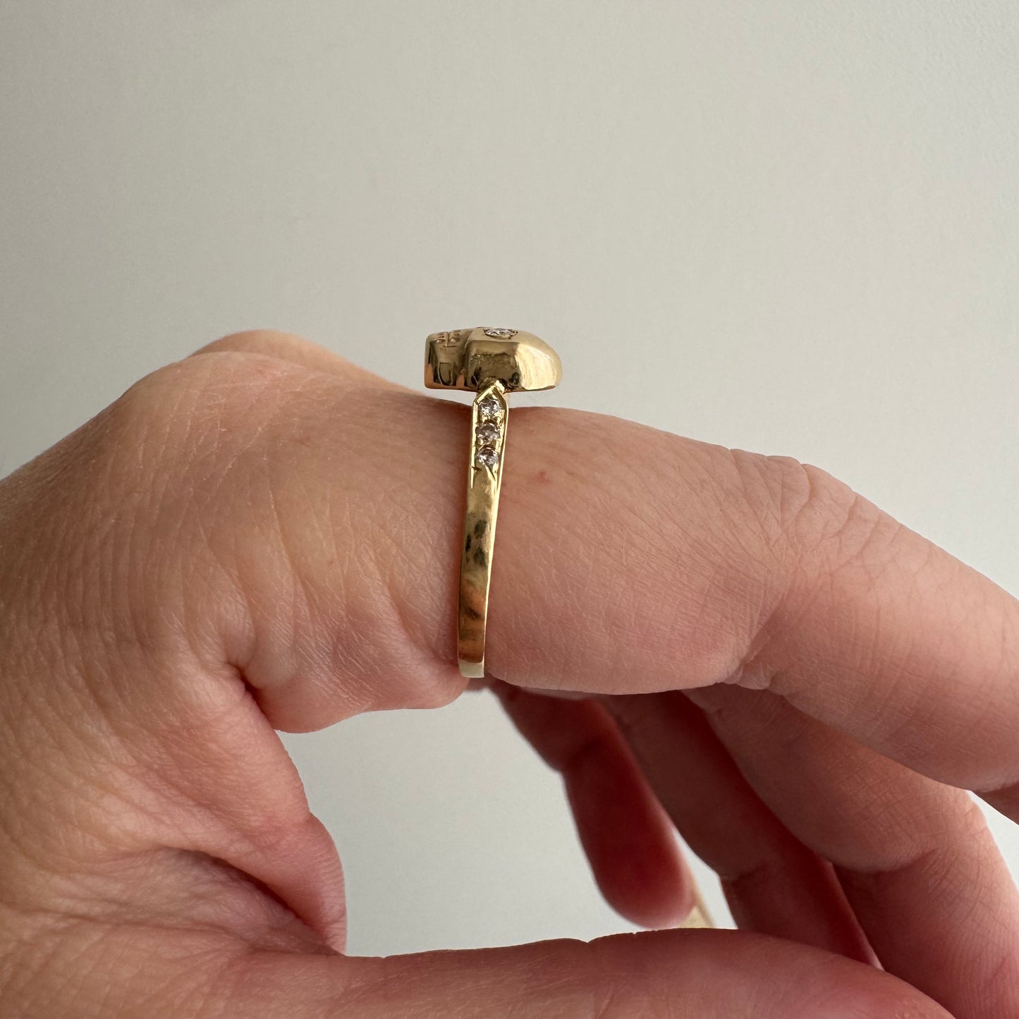 reimagined V I N T A G E // memento mori / 14k and pave diamond arrow motif skull stacking ring / size 7