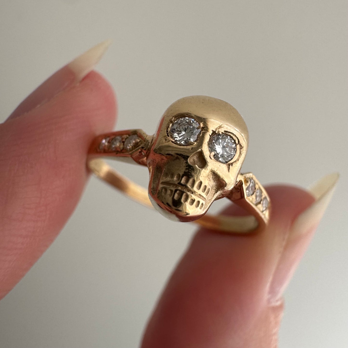 reimagined V I N T A G E // memento mori / 14k and pave diamond arrow motif skull stacking ring / size 7