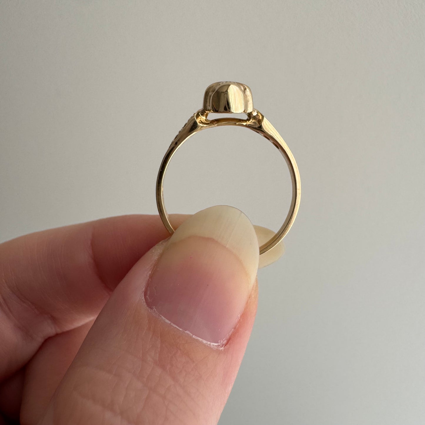 reimagined V I N T A G E // memento mori / 14k and pave diamond arrow motif skull stacking ring / size 7