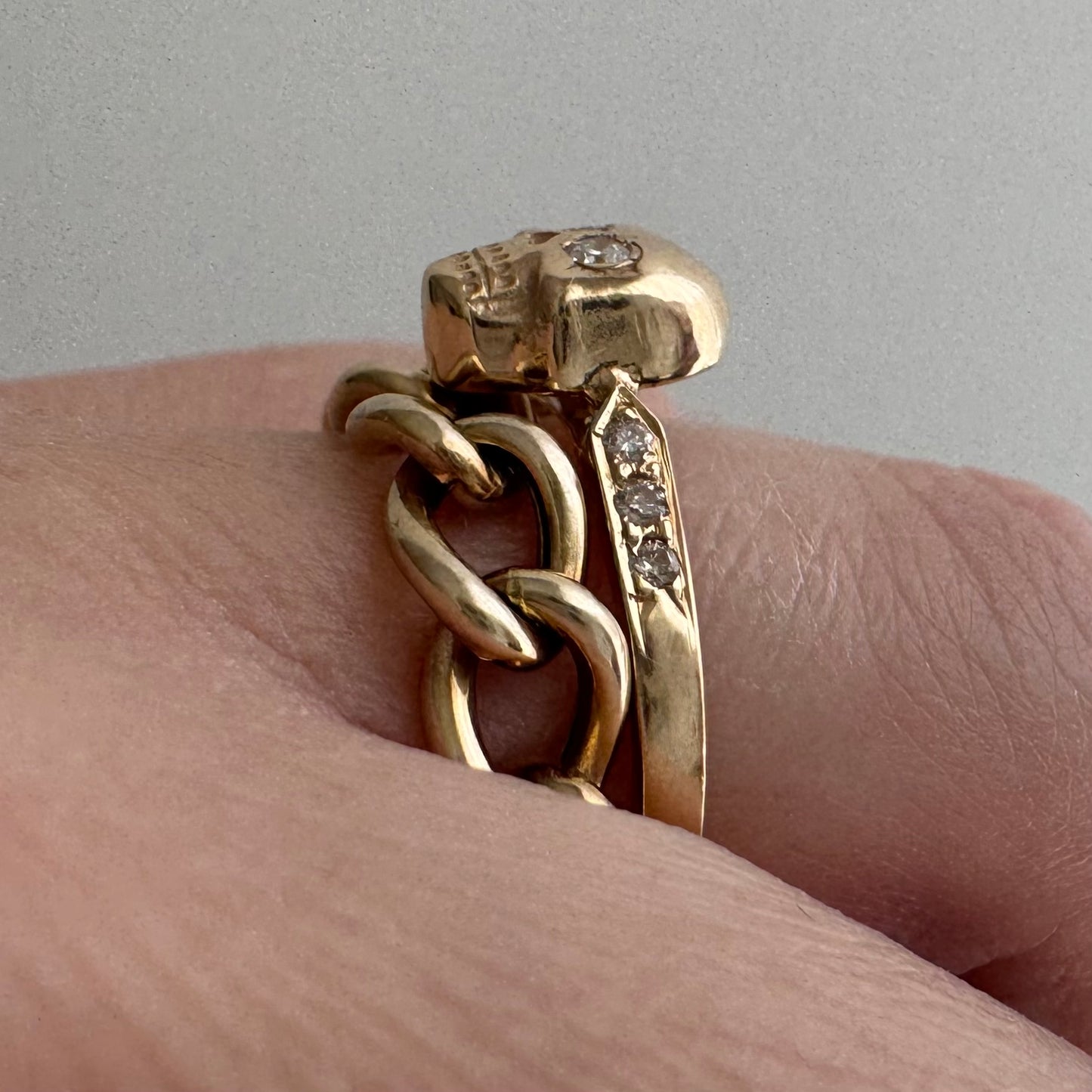 reimagined V I N T A G E // memento mori / 14k and pave diamond arrow motif skull stacking ring / size 7