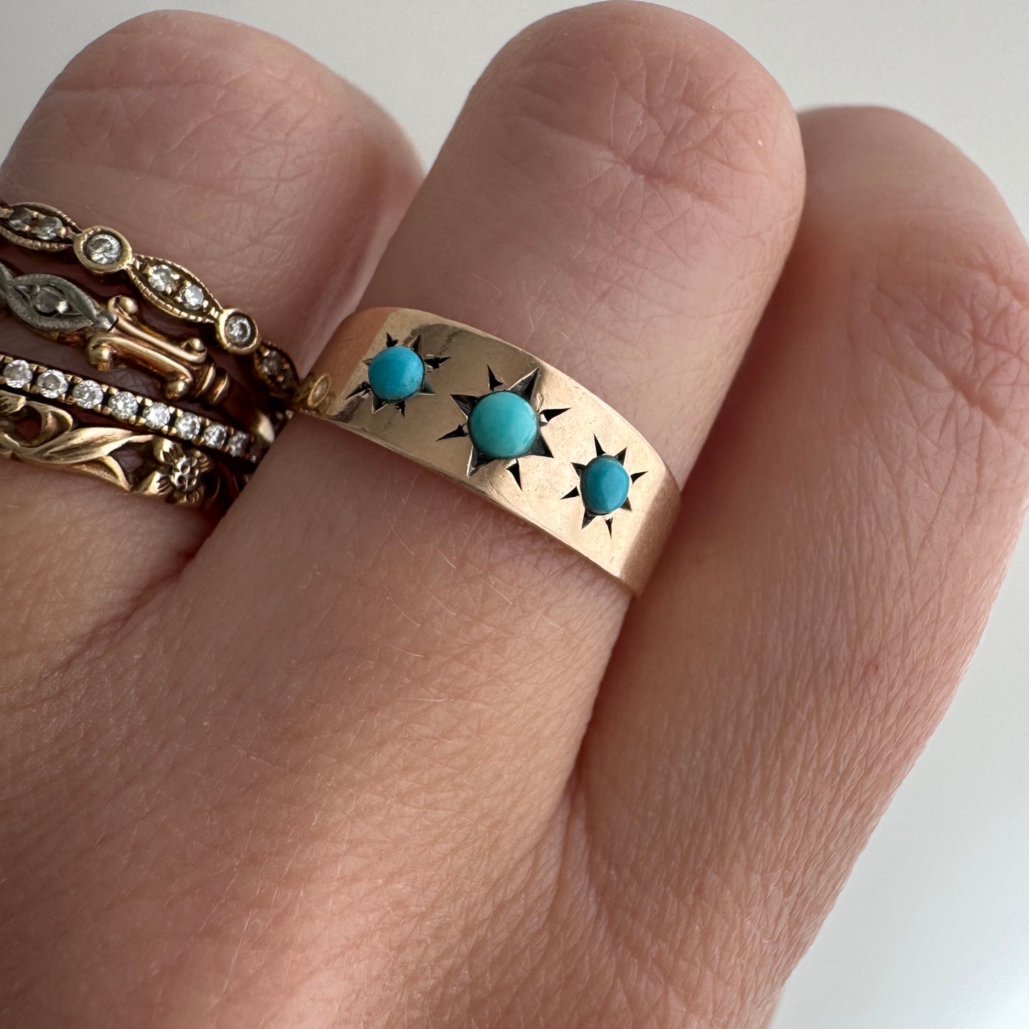 reimagined A N T I Q U E // 9k rosy yellow gold starburst trilogy band with turquoise / size 7