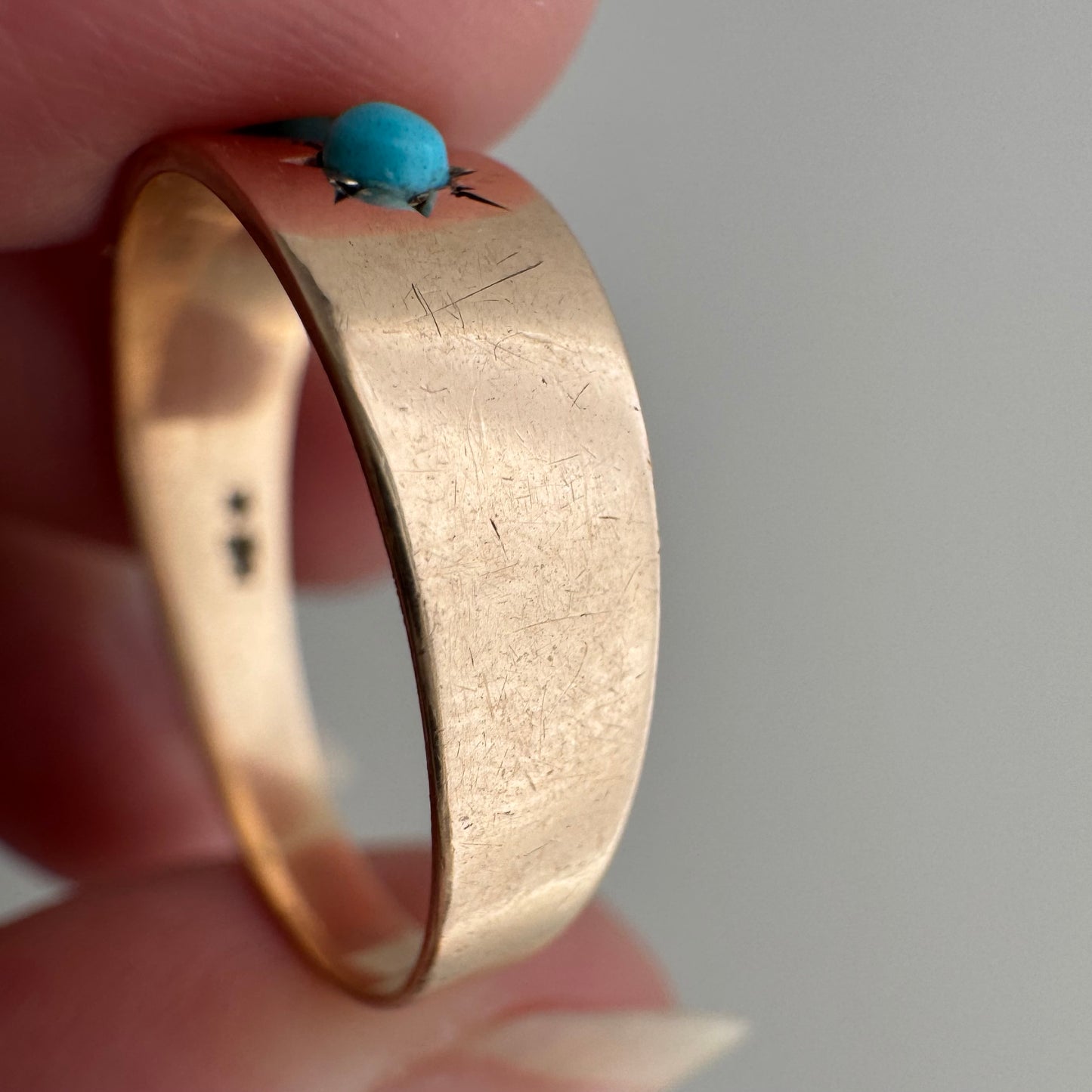 reimagined A N T I Q U E // 9k rosy yellow gold starburst trilogy band with turquoise / size 7