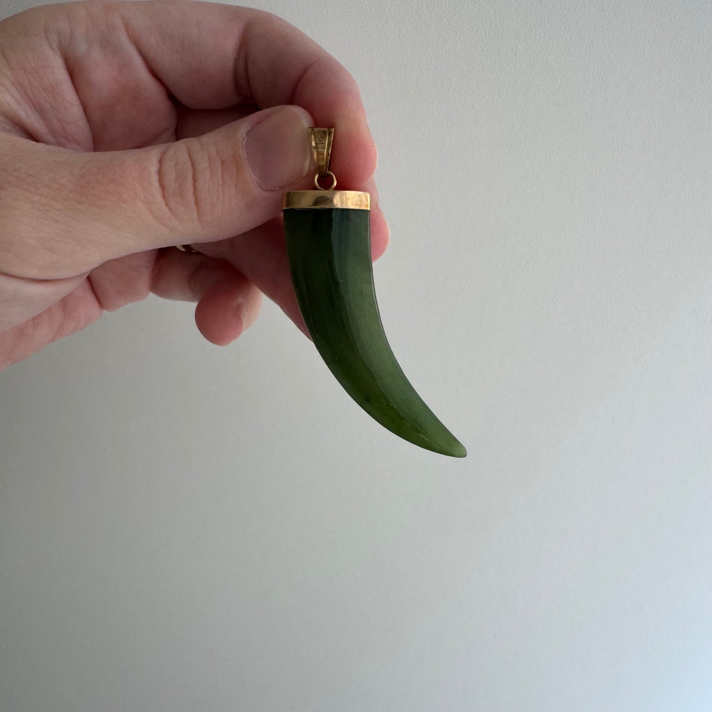 V I N T A G E // enviable tusk / 14k and green jade tusk or talon shaped pendant