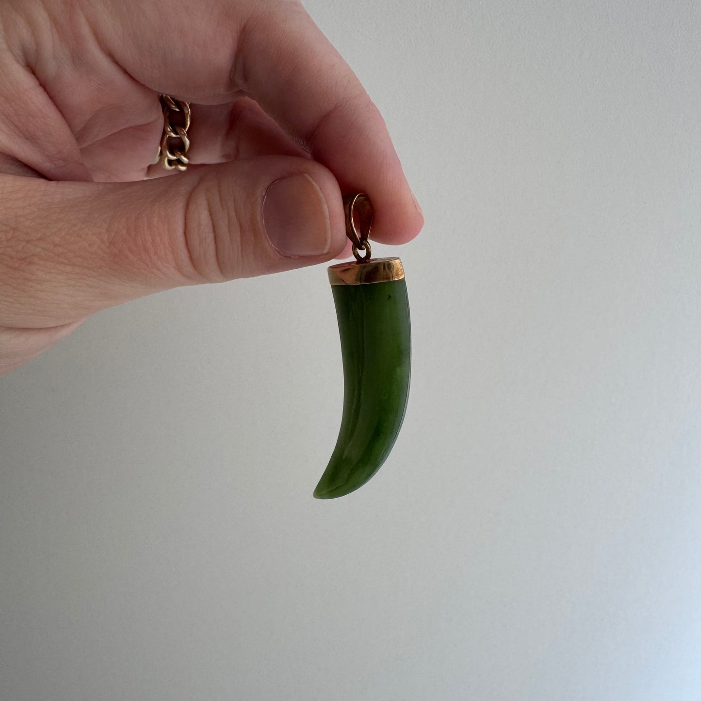 V I N T A G E // enviable tusk / 14k and green jade tusk or talon shaped pendant