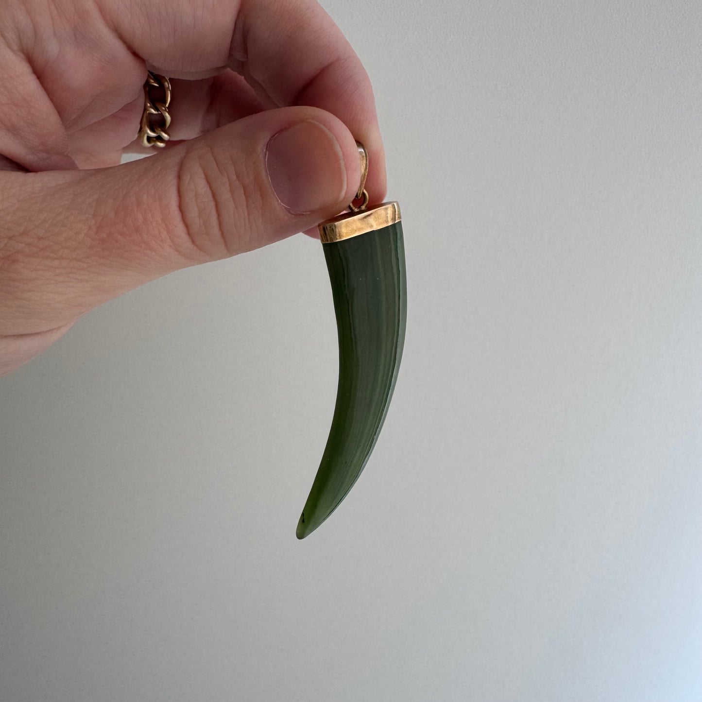V I N T A G E // enviable tusk / 14k and green jade tusk or talon shaped pendant