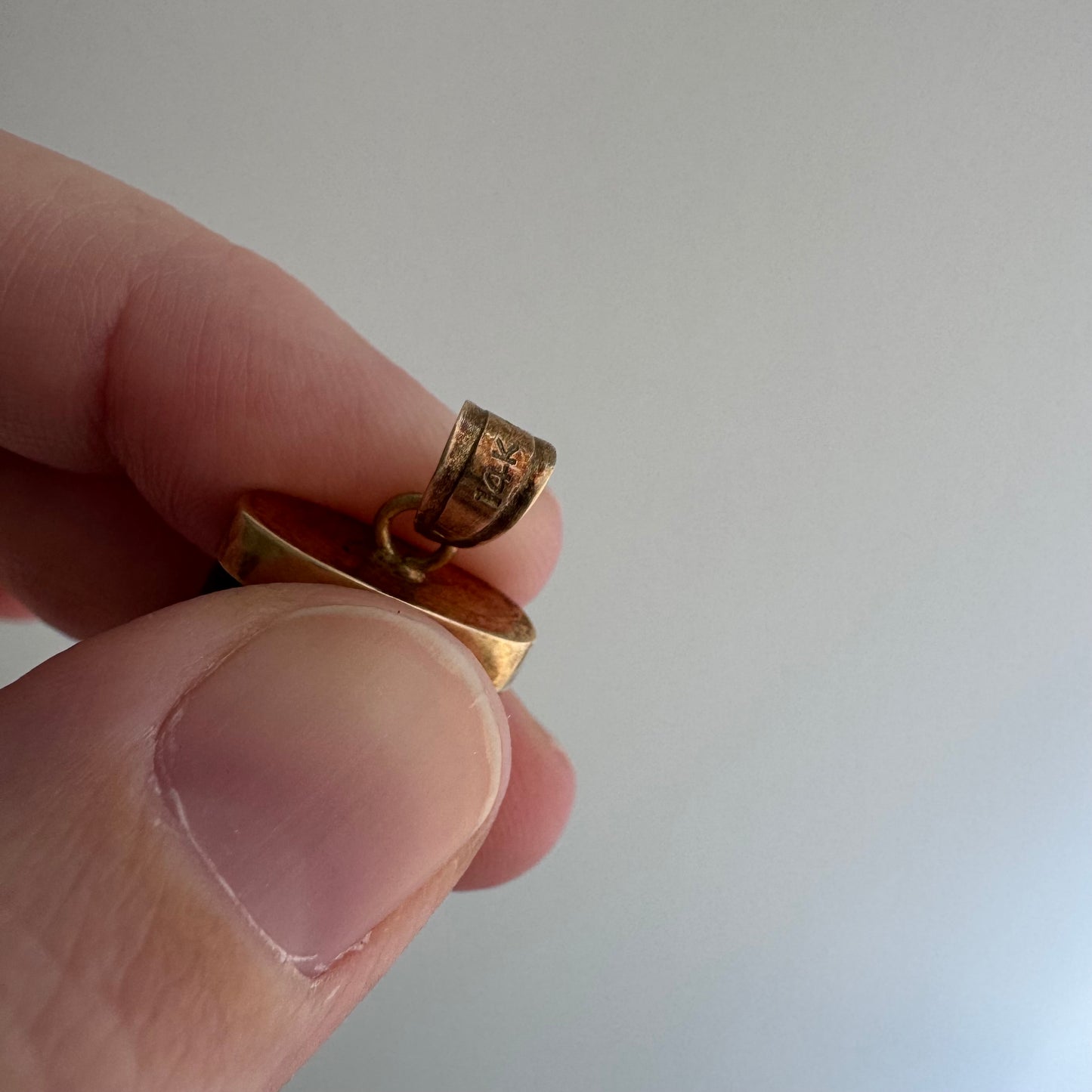 V I N T A G E // enviable tusk / 14k and green jade tusk or talon shaped pendant