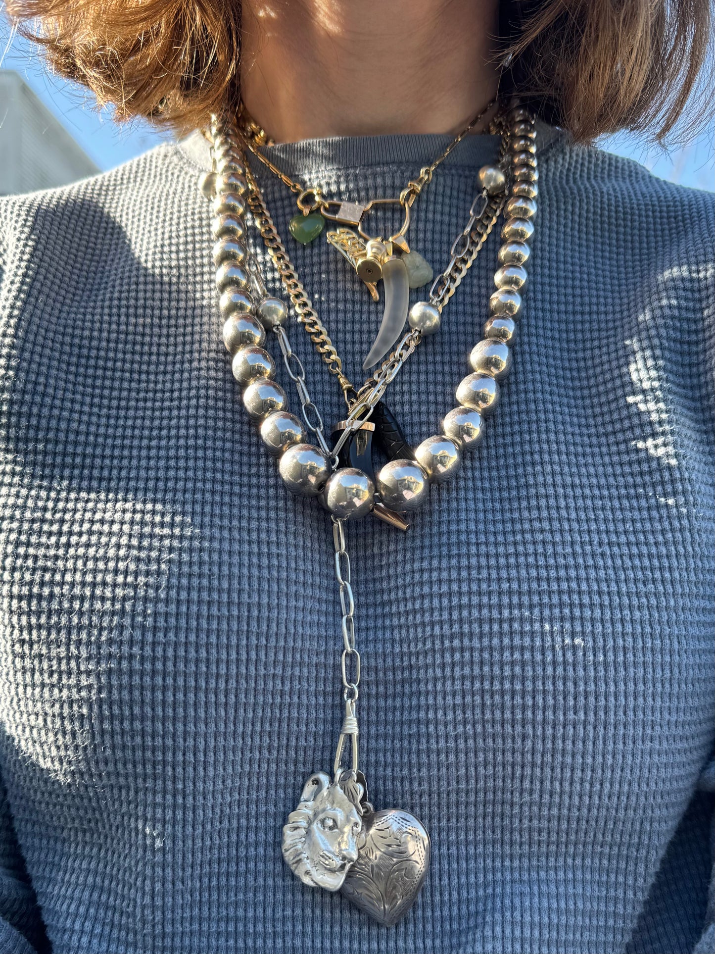 LIKE A LIVE // short term discounted price / sterling silver dented oversized engraved heart locket