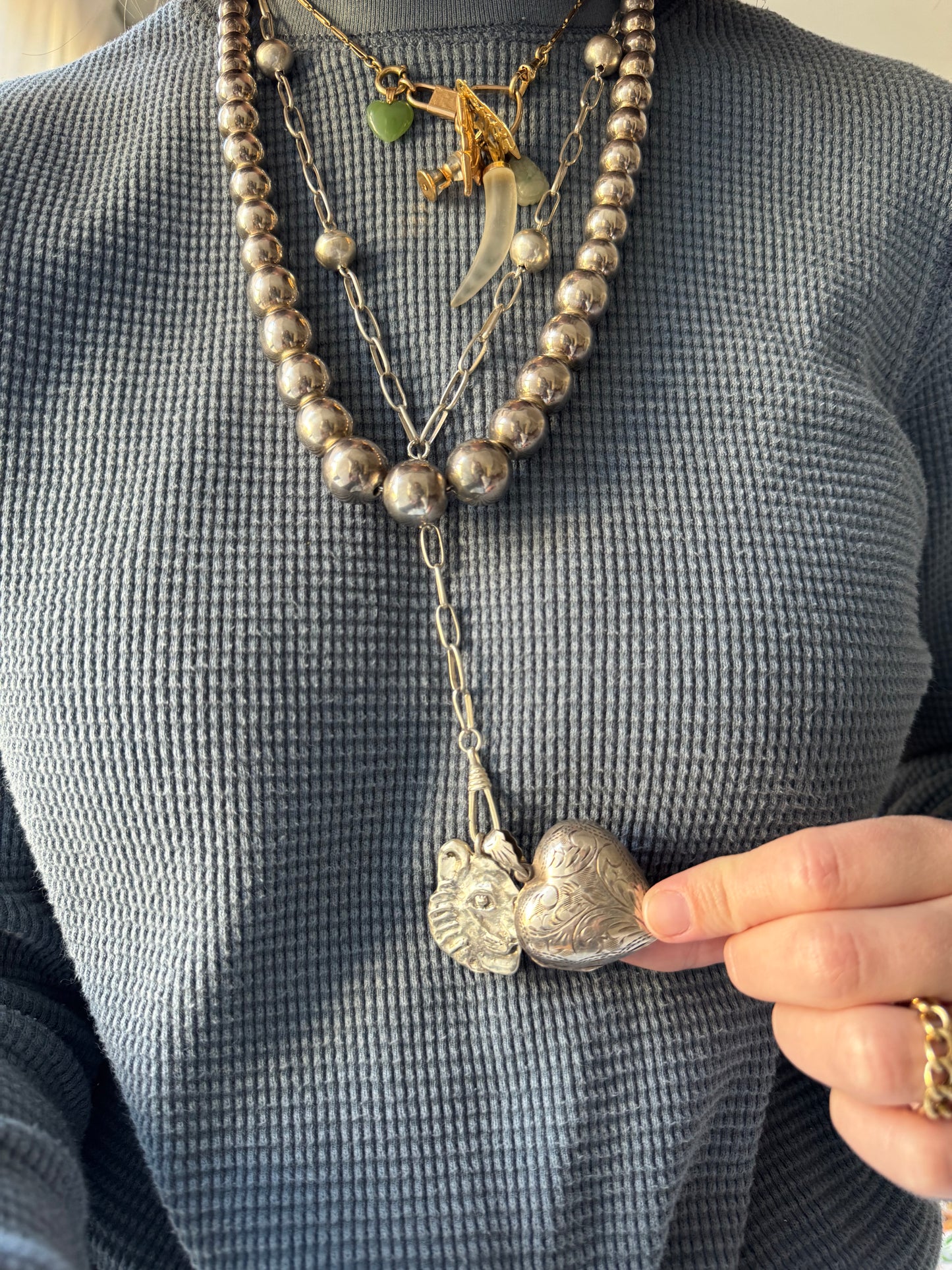 LIKE A LIVE // short term discounted price / sterling silver dented oversized engraved heart locket