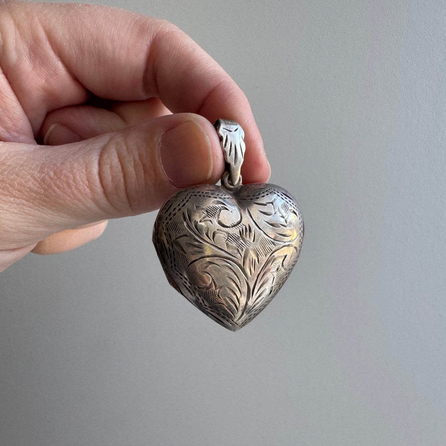 LIKE A LIVE // short term discounted price / sterling silver dented oversized engraved heart locket