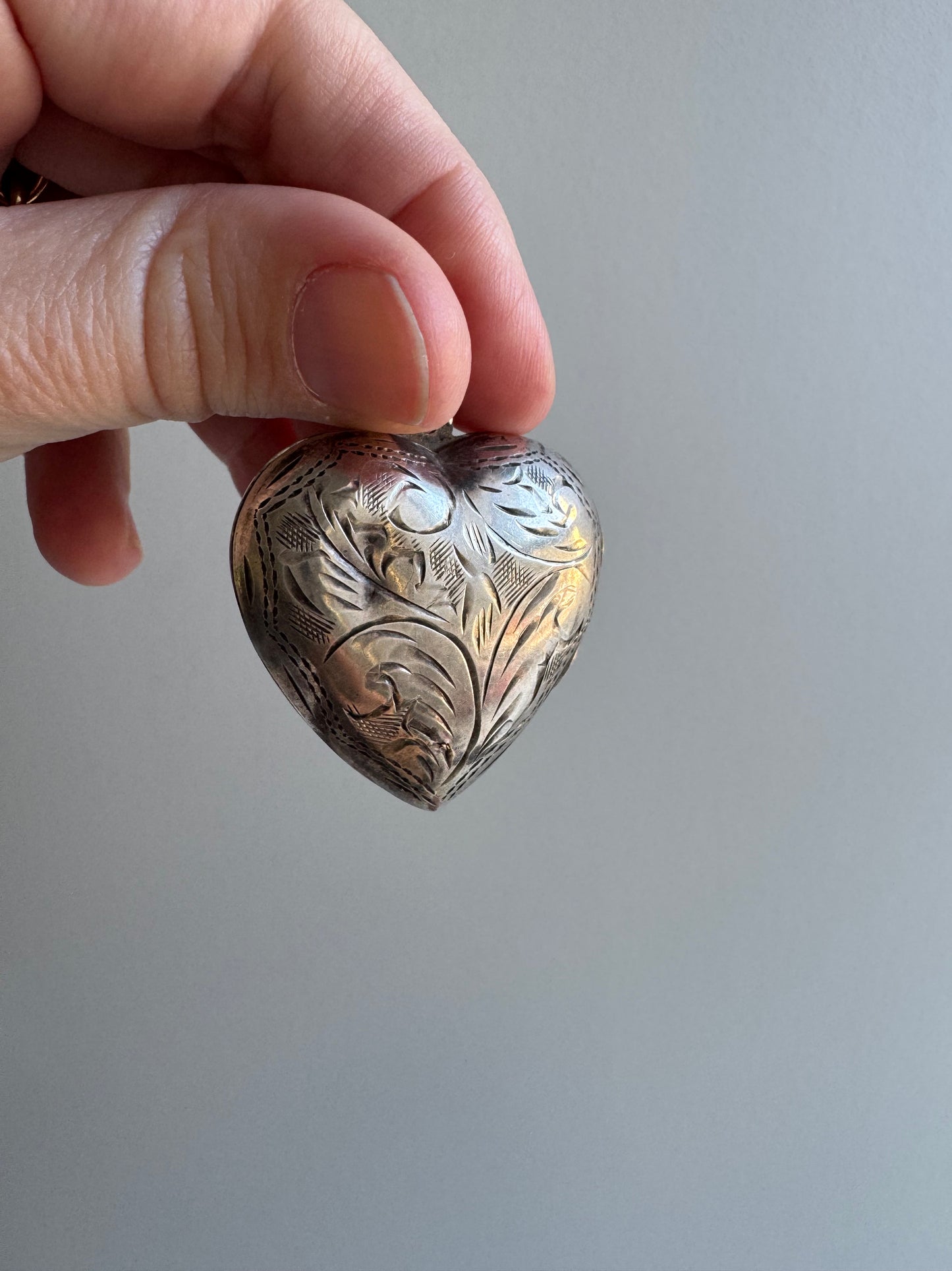 LIKE A LIVE // short term discounted price / sterling silver dented oversized engraved heart locket