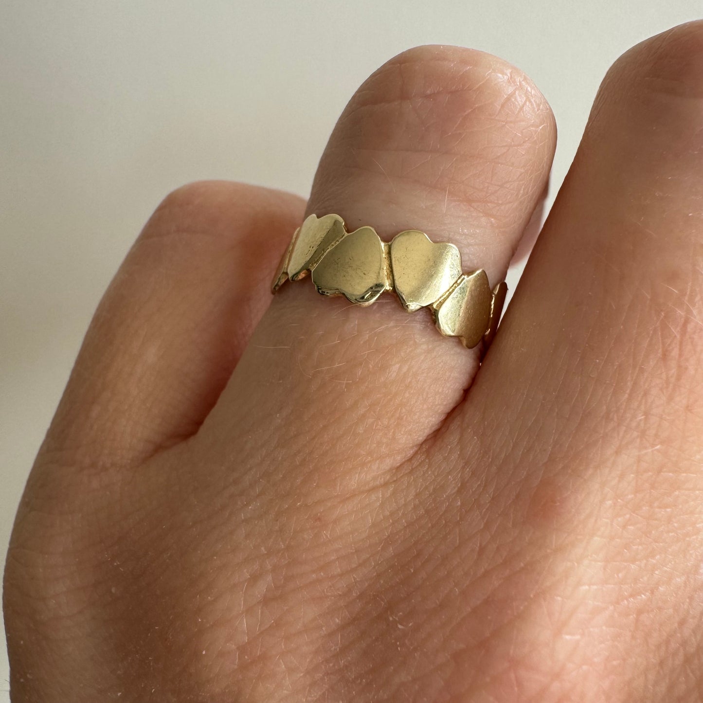 V I N T A G E // string of hearts / 10k yellow gold heart eternity band / fits like a size 4.5