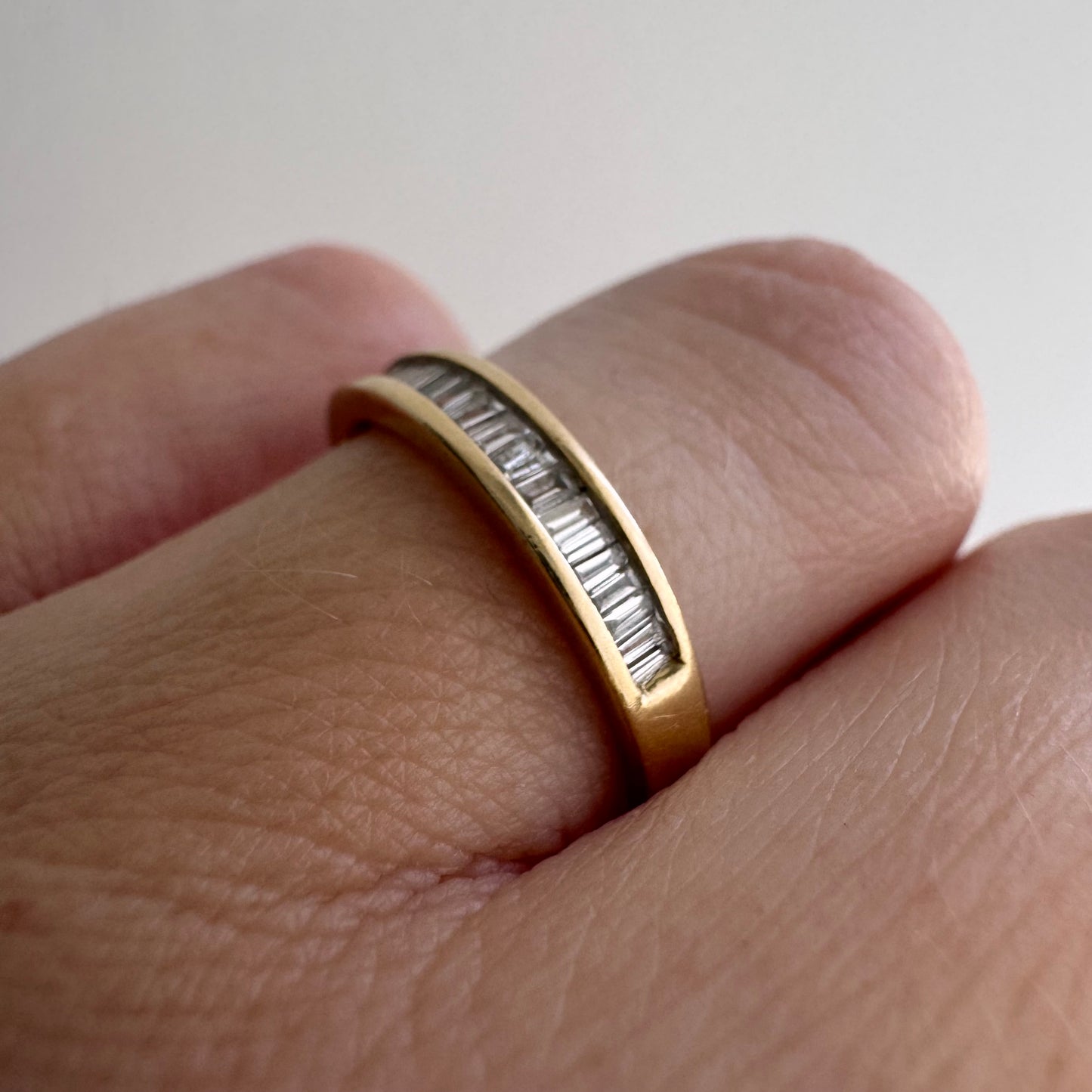 V I N T A G E // sparkle geometry / 14k yellow gold and channel set baguette diamond half eternity band / size 5.75