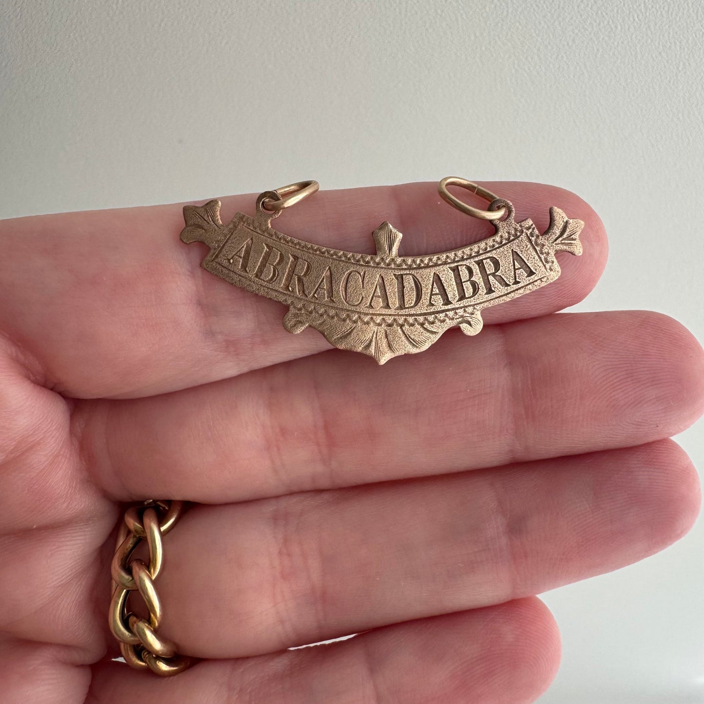 N E W // abracadabra / 10k rosy gold abracadabra / a pendant