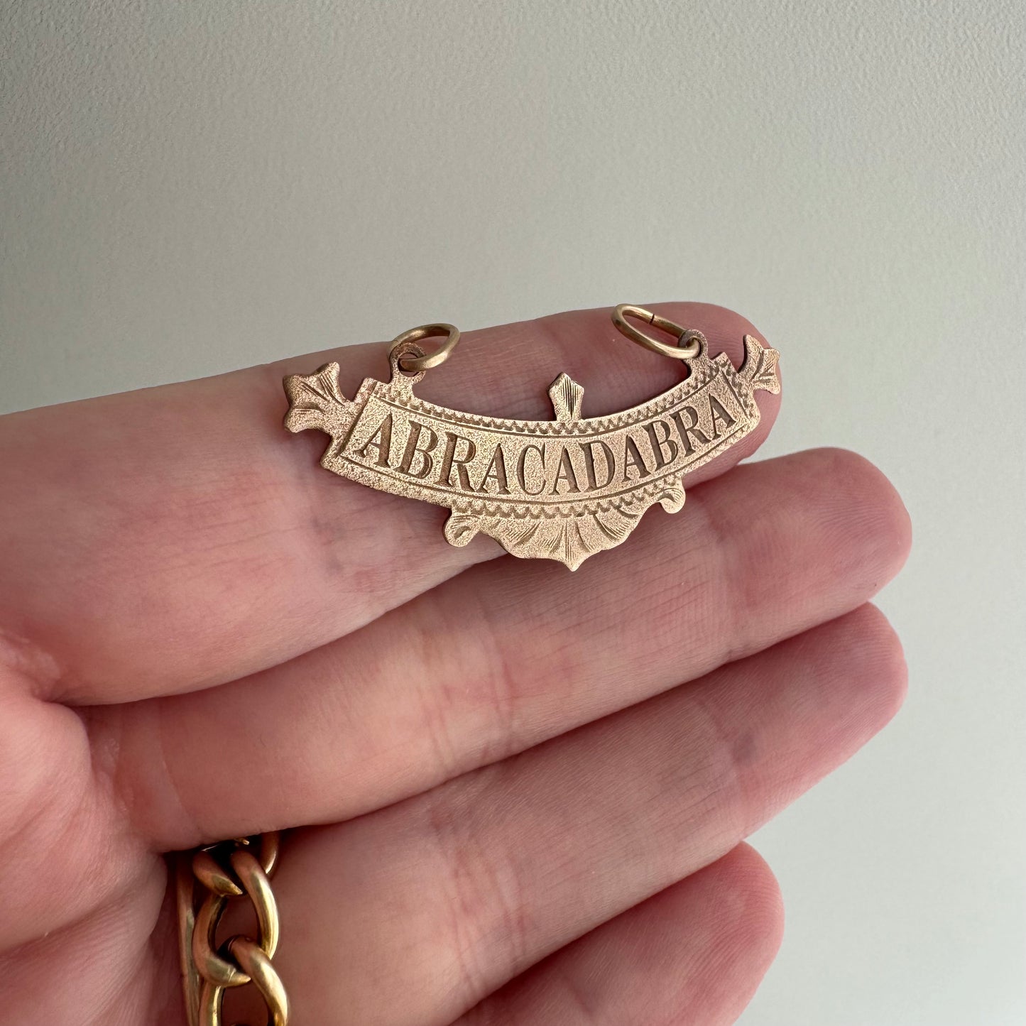 N E W // abracadabra / 10k rosy gold abracadabra / a pendant