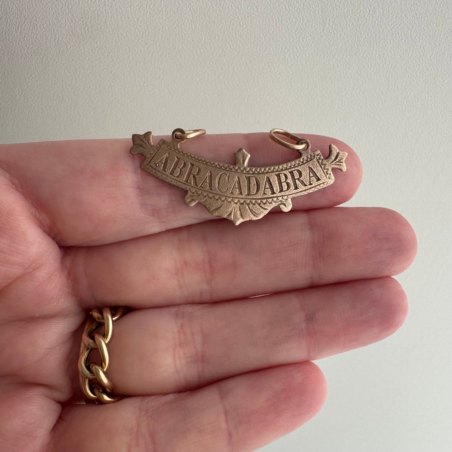 N E W // abracadabra / 10k rosy gold abracadabra / a pendant