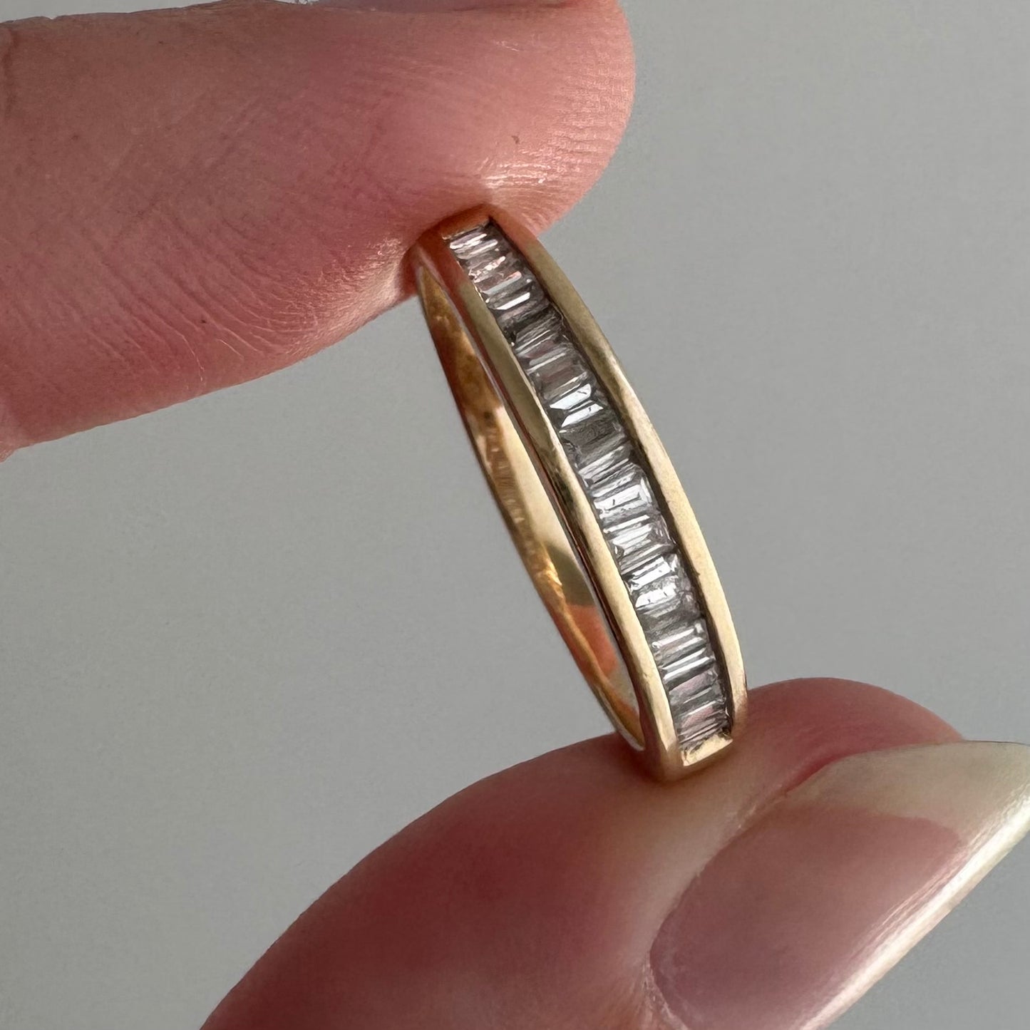 V I N T A G E // sparkle geometry / 14k yellow gold and channel set baguette diamond half eternity band / size 5.75