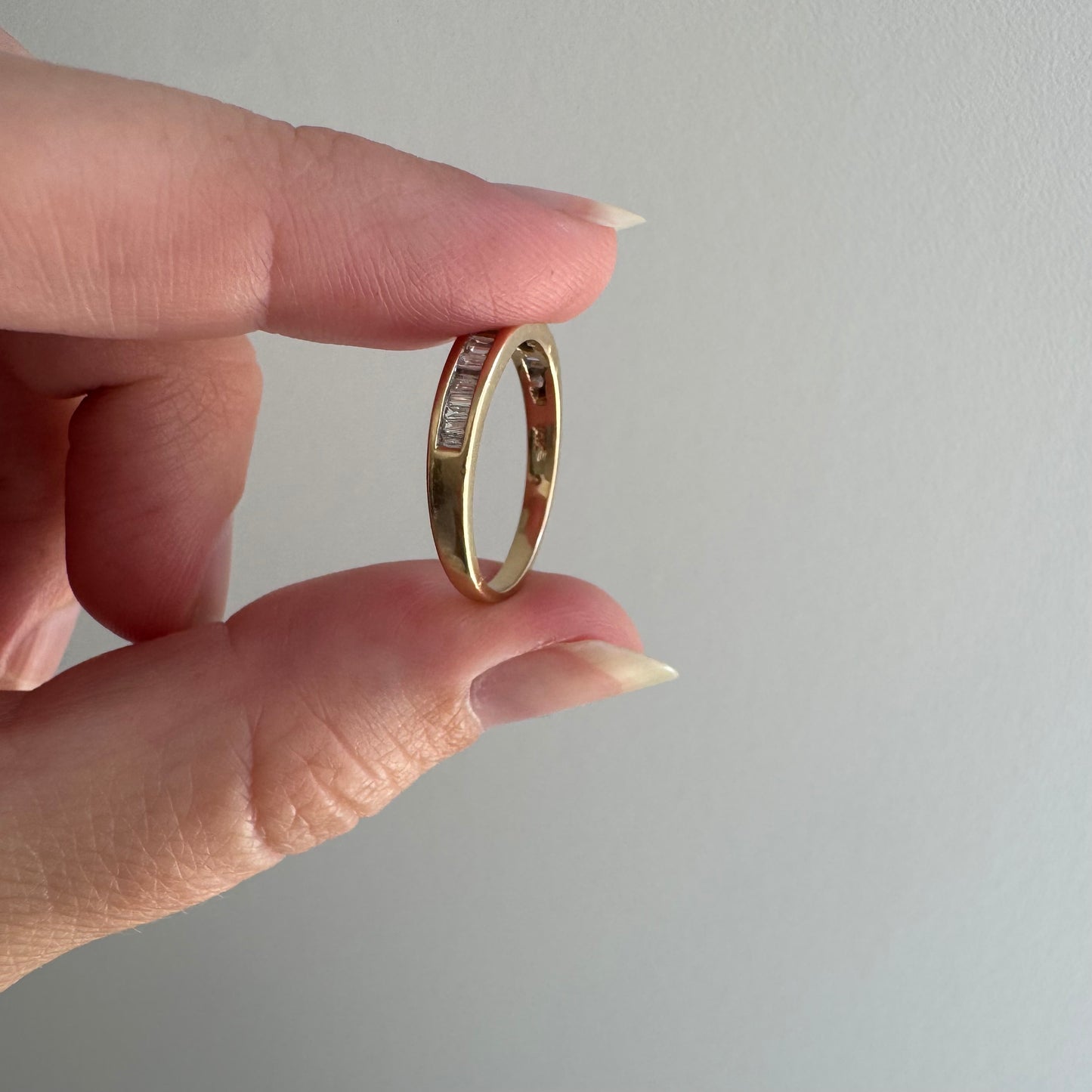 V I N T A G E // sparkle geometry / 14k yellow gold and channel set baguette diamond half eternity band / size 5.75