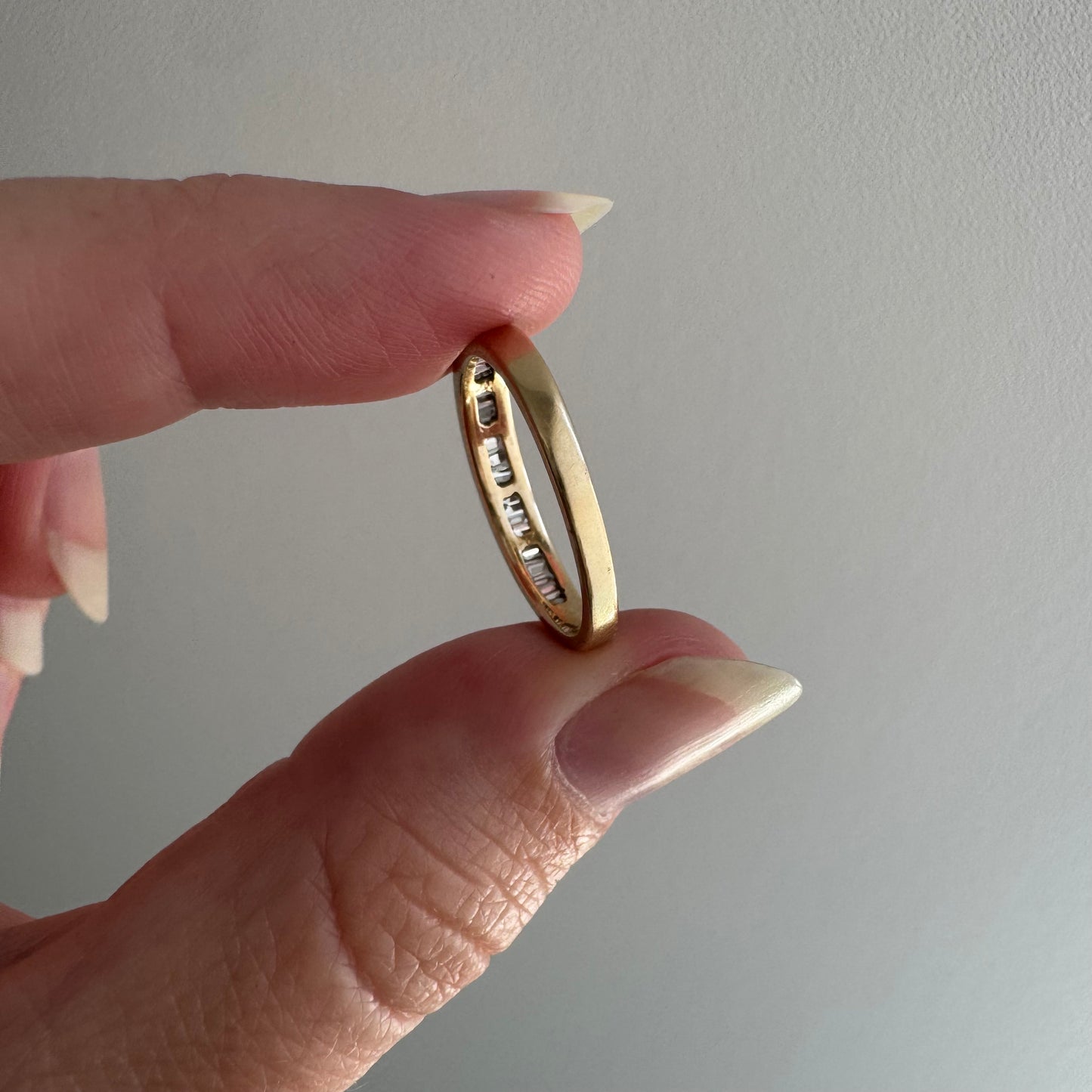 V I N T A G E // sparkle geometry / 14k yellow gold and channel set baguette diamond half eternity band / size 5.75