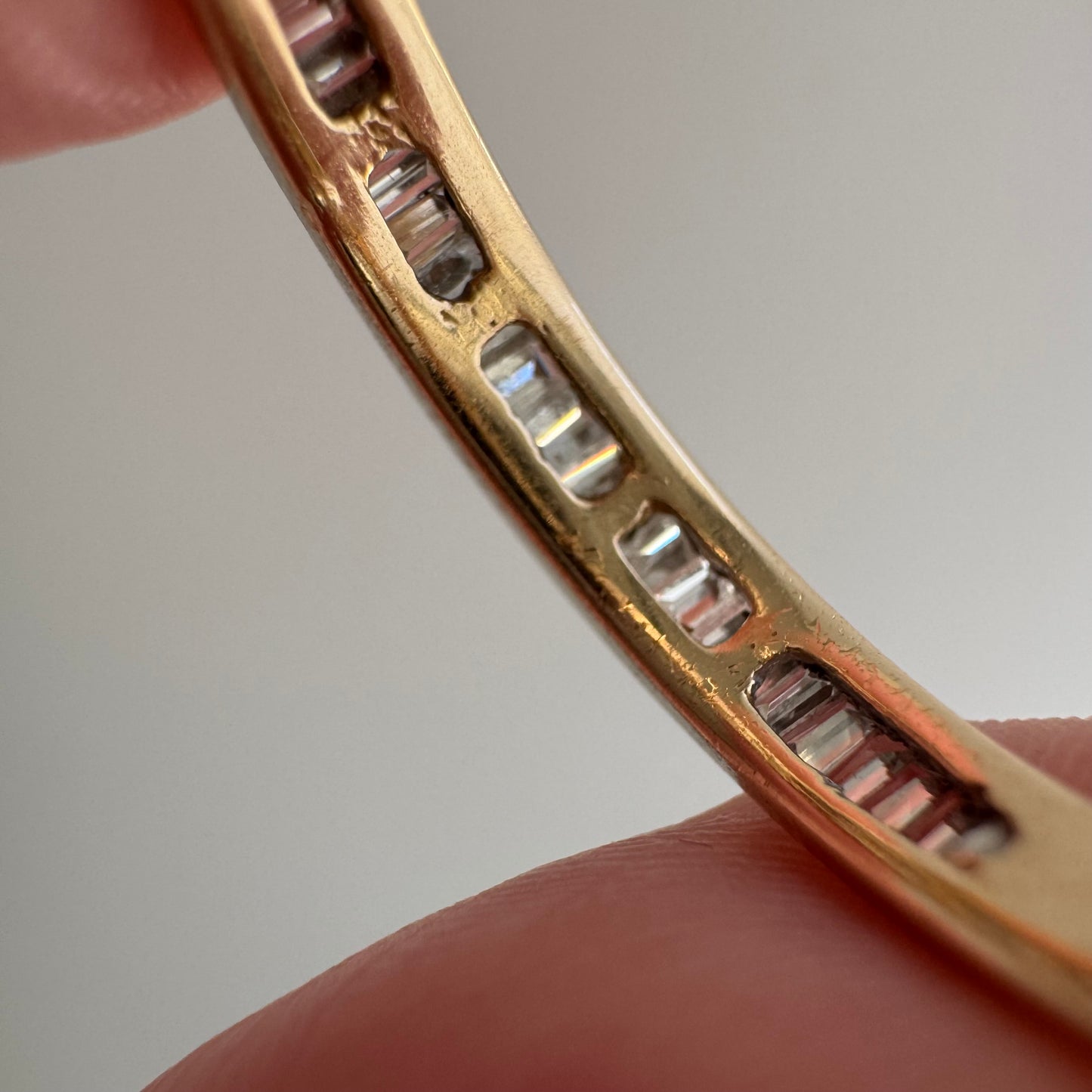 V I N T A G E // sparkle geometry / 14k yellow gold and channel set baguette diamond half eternity band / size 5.75