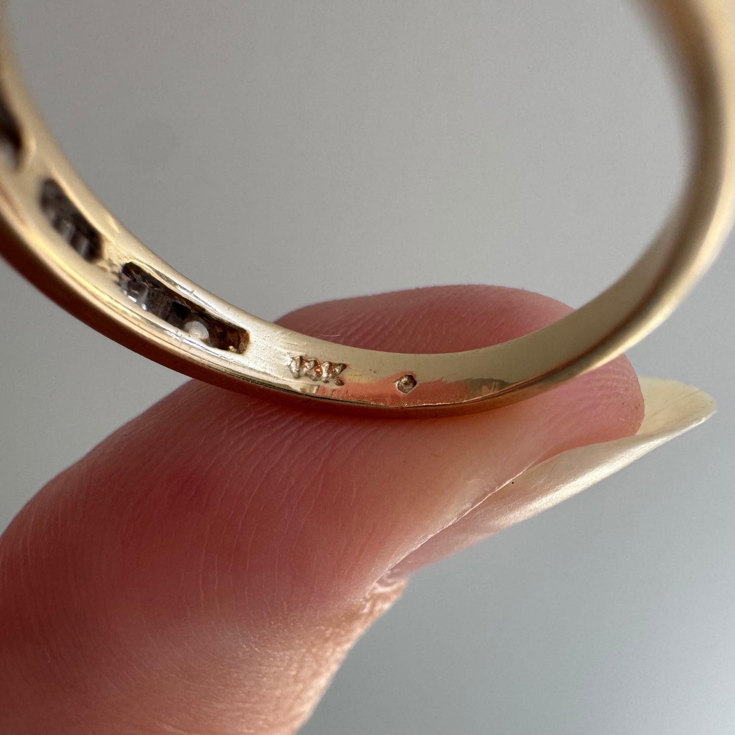 V I N T A G E // sparkle geometry / 14k yellow gold and channel set baguette diamond half eternity band / size 5.75