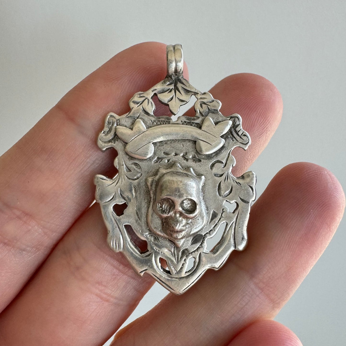 A N T I Q U E // memento mori achievement / sterling silver British fob medal with skull face / a pendant