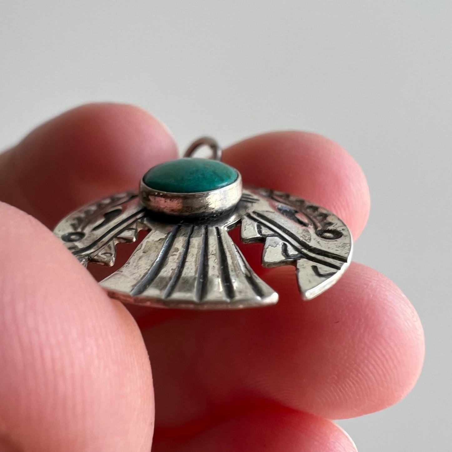 V I N T A G E // thunderbird hug / sterling silver and azurmalachite stamped thunderbird pendant