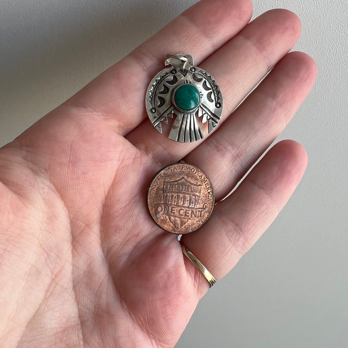 V I N T A G E // thunderbird hug / sterling silver and azurmalachite stamped thunderbird pendant