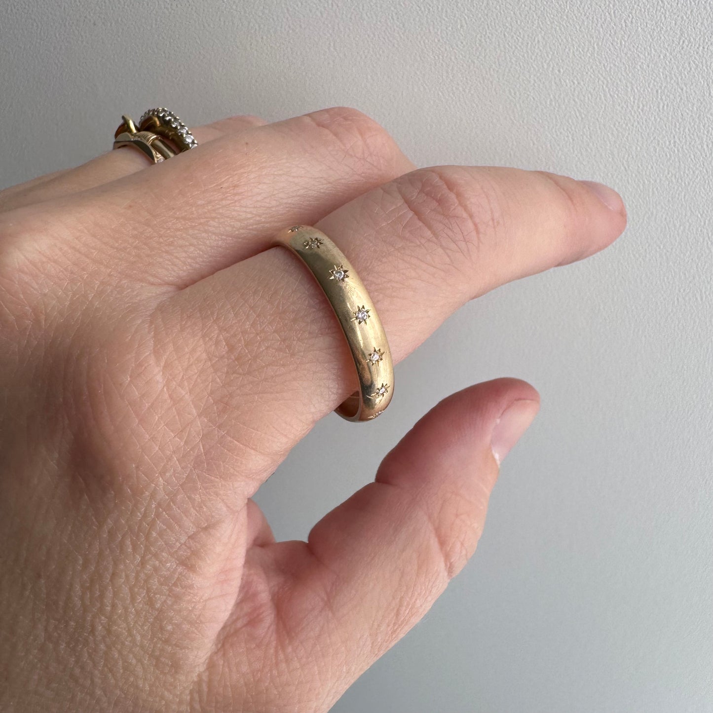 reimagined V I N T A G E // star story / 14k comfort fit 4.3mm band with seven new star-set diamonds / size 11