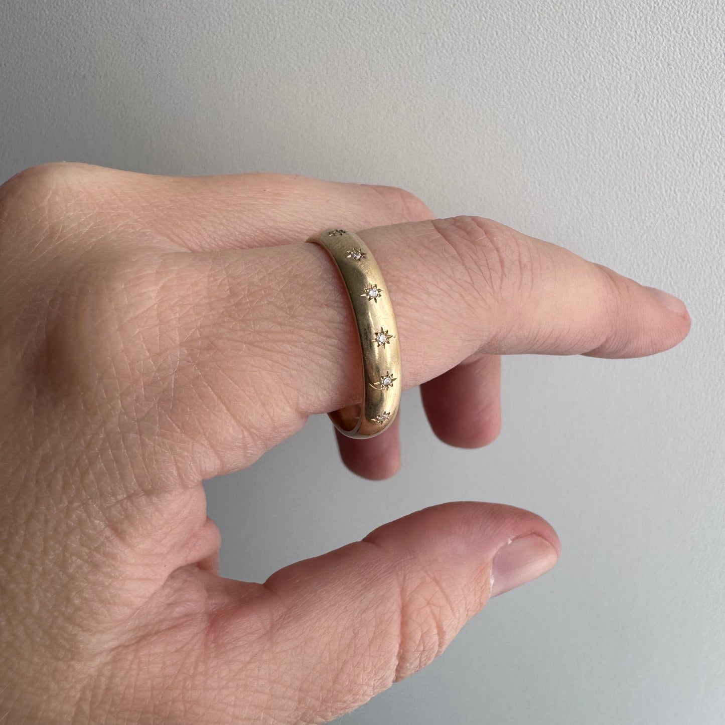 reimagined V I N T A G E // star story / 14k comfort fit 4.3mm band with seven new star-set diamonds / size 11