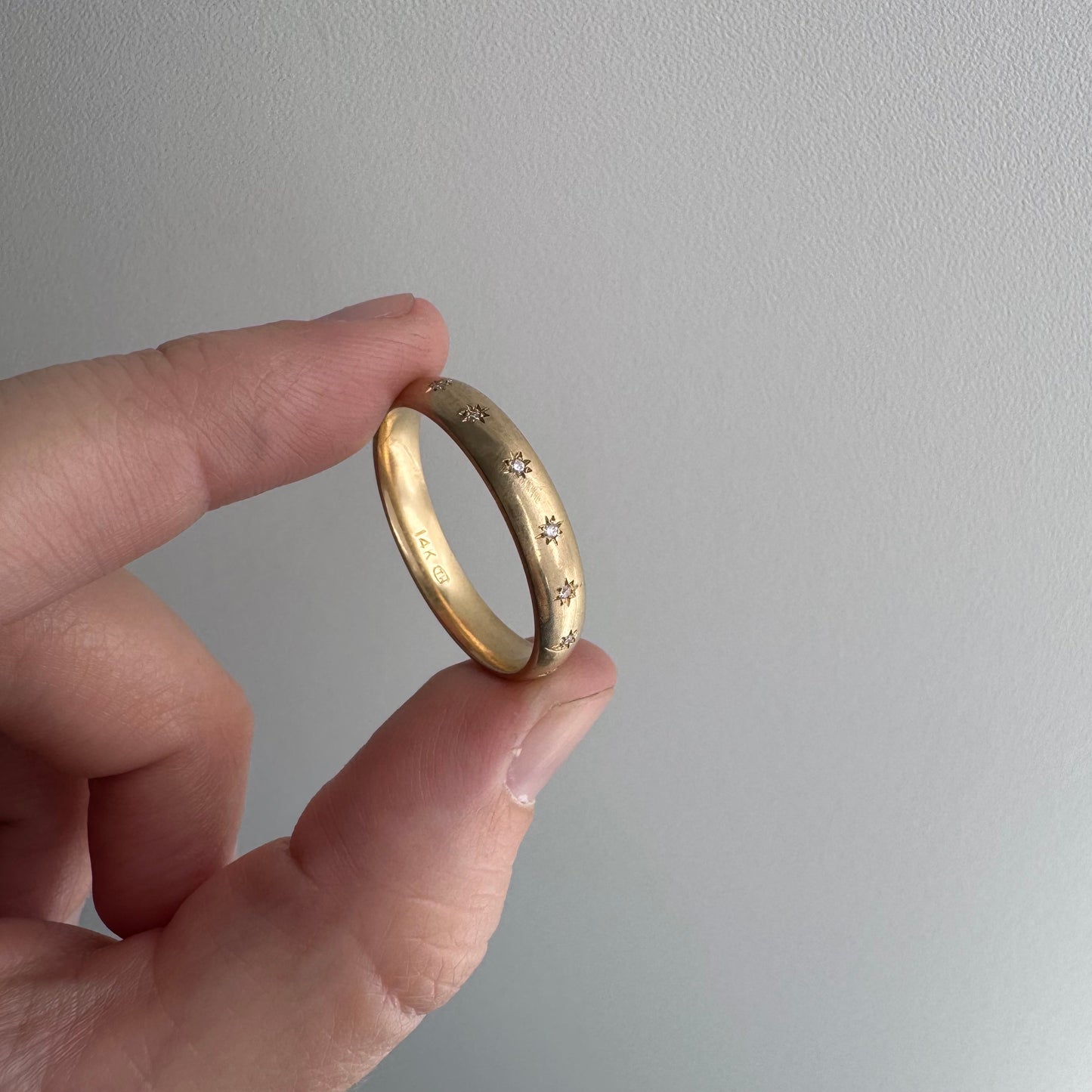 reimagined V I N T A G E // star story / 14k comfort fit 4.3mm band with seven new star-set diamonds / size 11