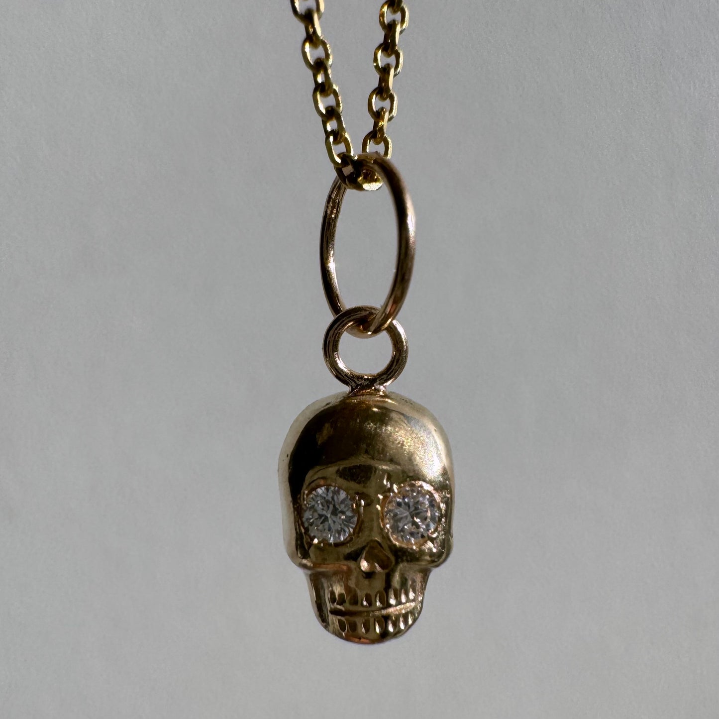 N E W // memento mori grin / 14k yellow gold skull with diamond eyes / a pendant