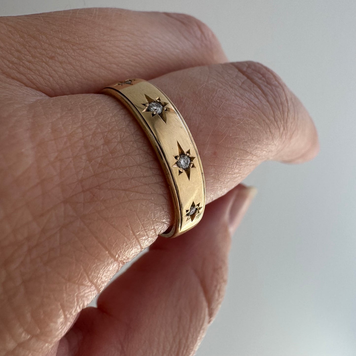 reimagined V I N T A G E // 14k yellow gold starburst trilogy band with diamonds / size 9.5 to 10