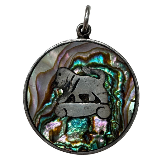 V I N T A G E // psychedelic skateboarding foo dog lion / sterling silver and abalone / a pendant