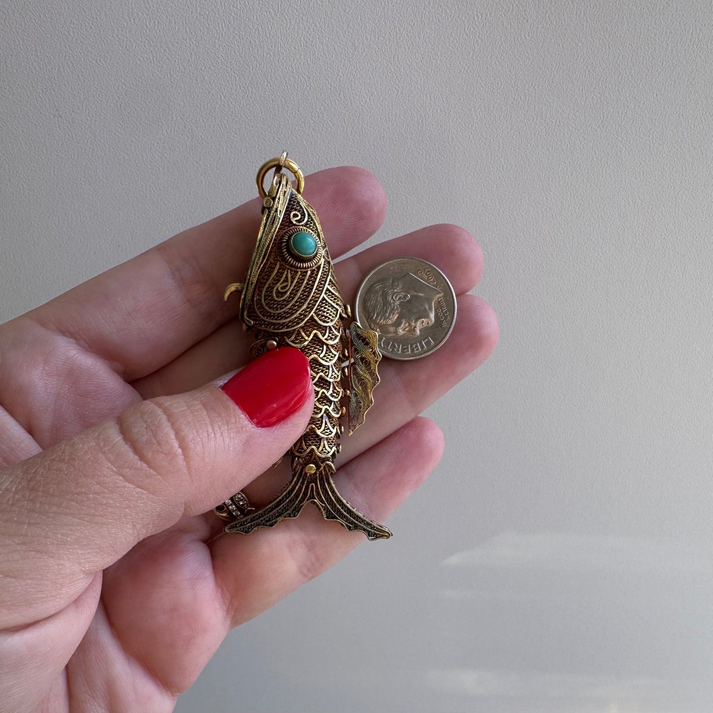 V I N T A G E // lucky catch / gold over sterling silver articulated wiggle fish with a secret / a large pendant