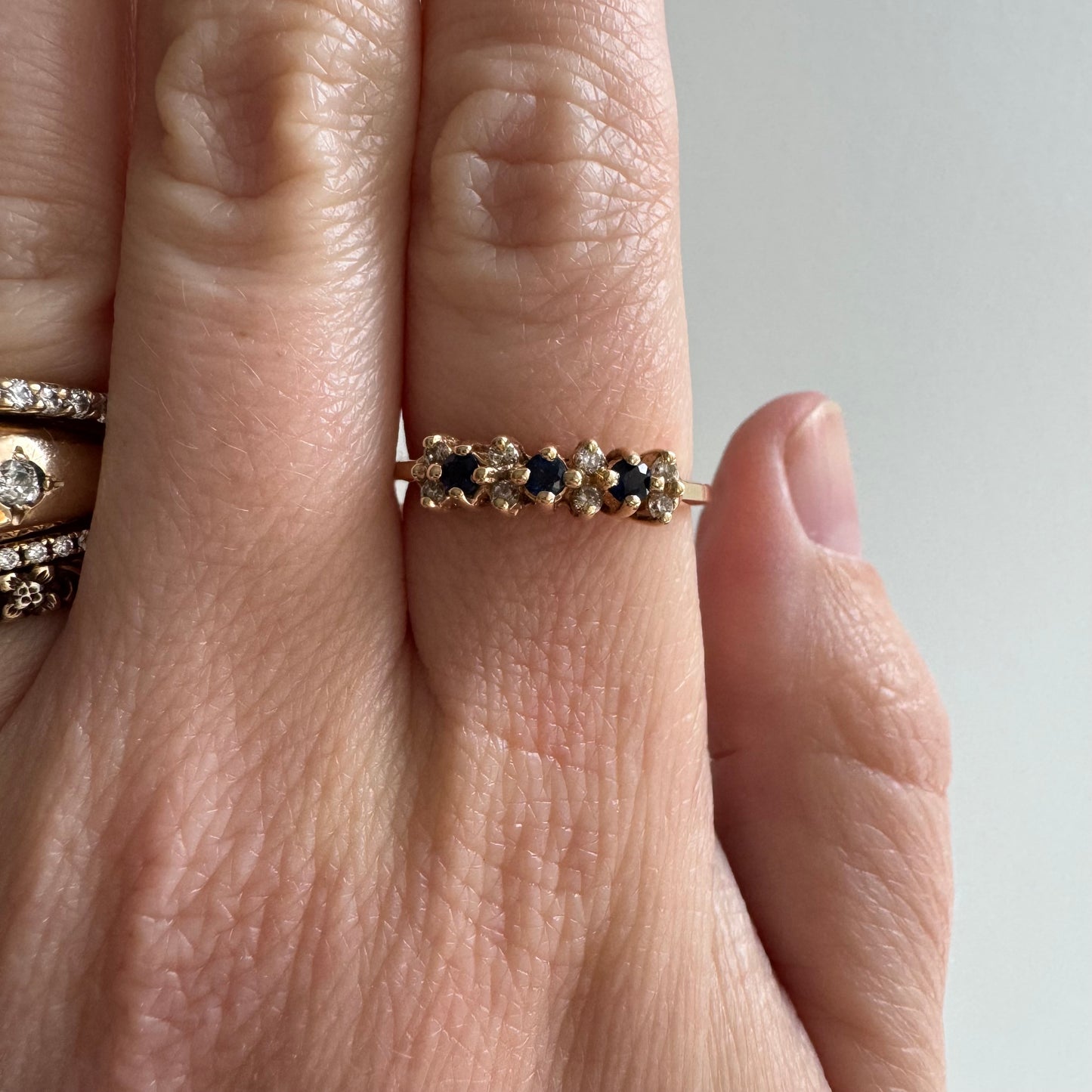 E S T A T E // sapphire timeline / 14k cluster band with sapphires and diamonds / size 6.75