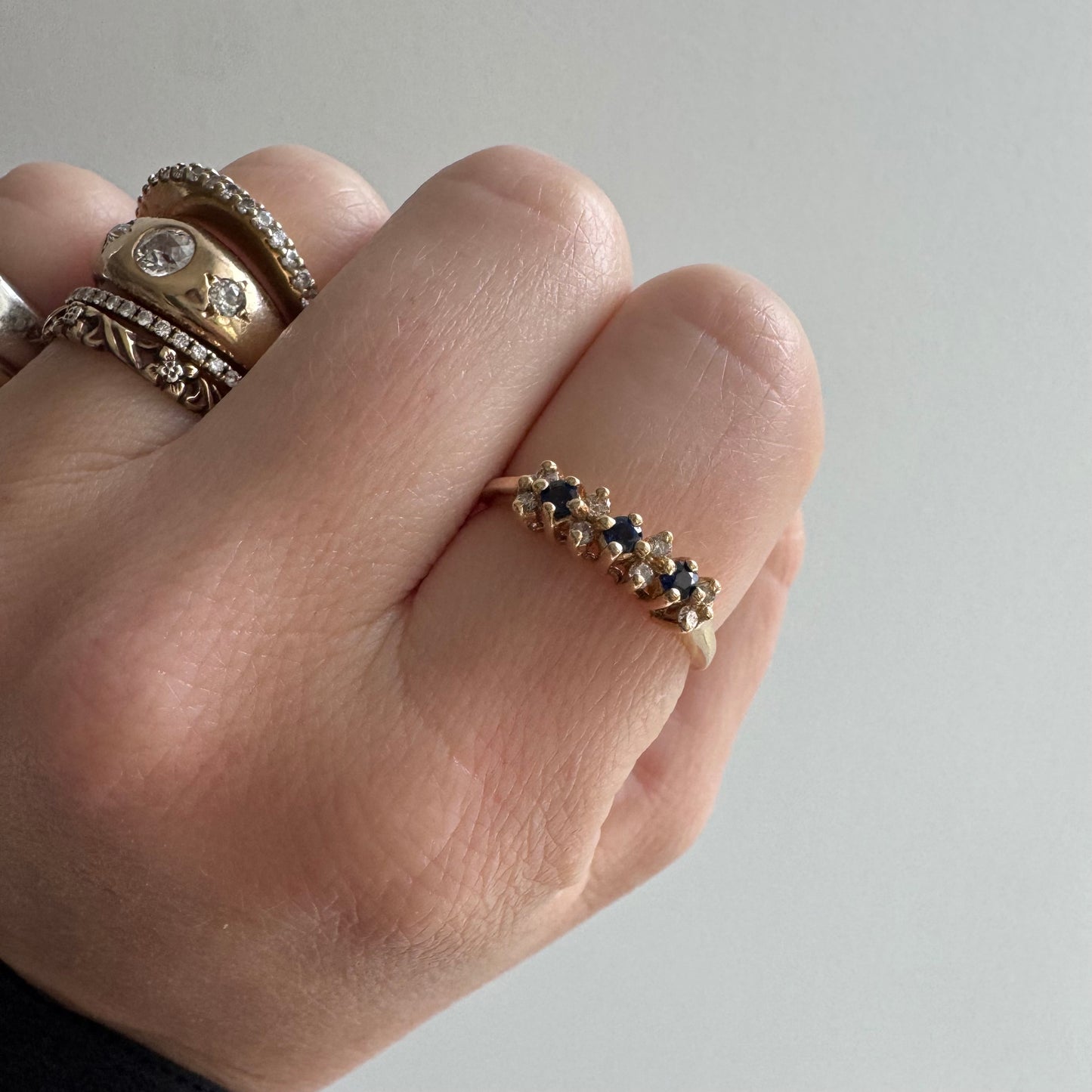 E S T A T E // sapphire timeline / 14k cluster band with sapphires and diamonds / size 6.75