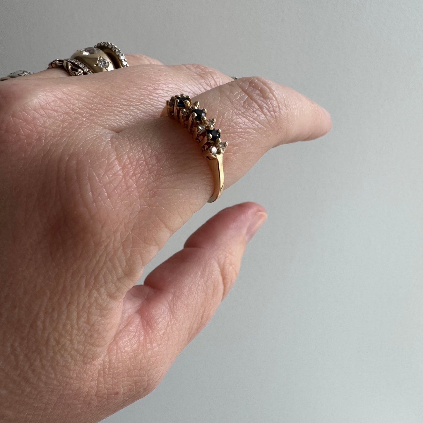 E S T A T E // sapphire timeline / 14k cluster band with sapphires and diamonds / size 6.75