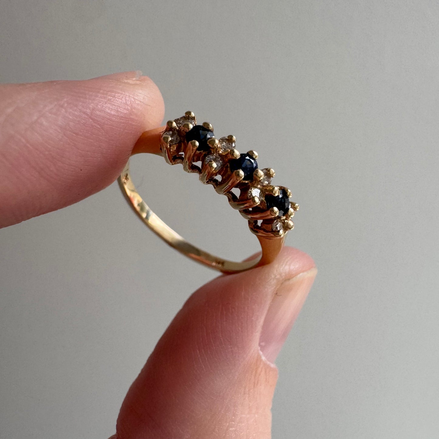 E S T A T E // sapphire timeline / 14k cluster band with sapphires and diamonds / size 6.75