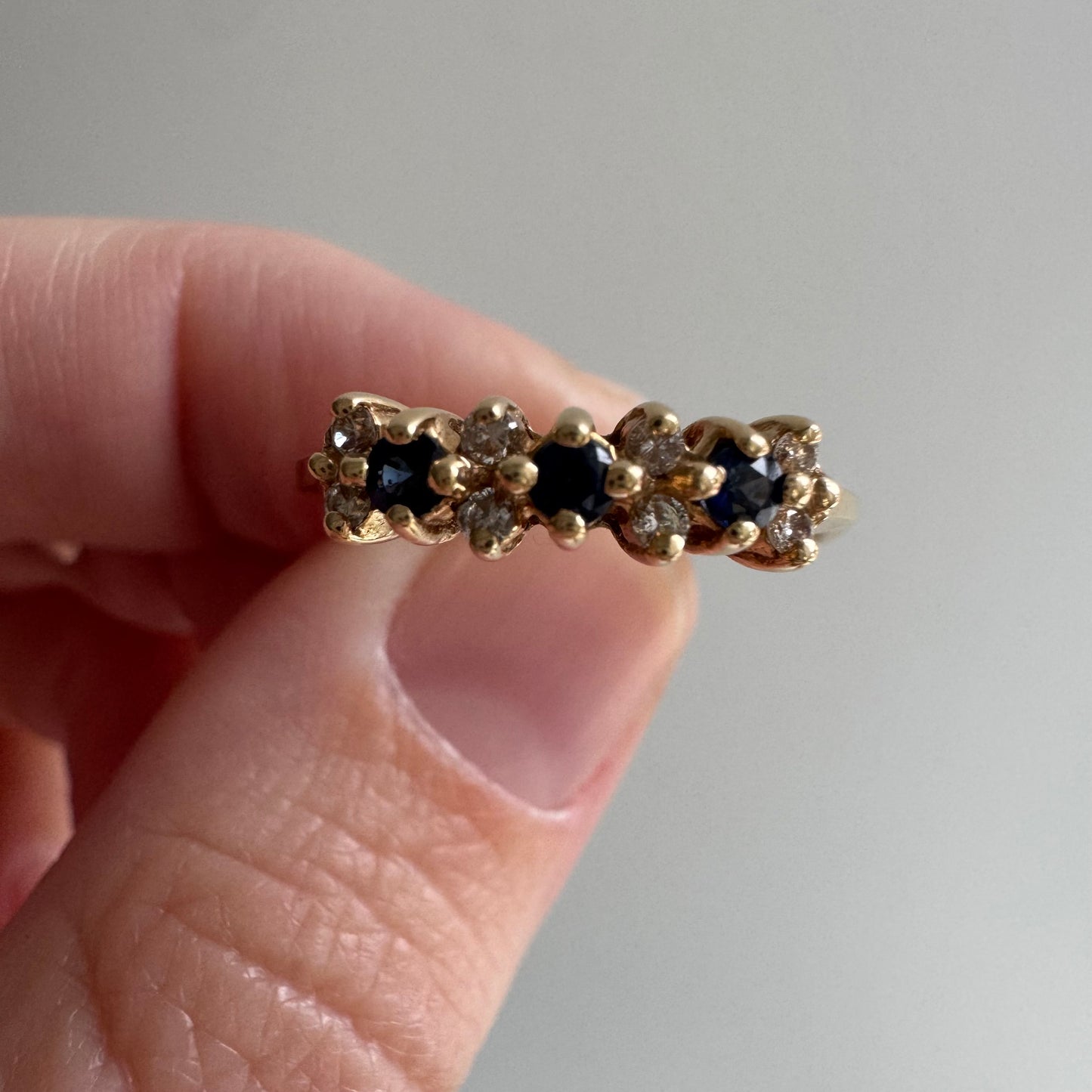 E S T A T E // sapphire timeline / 14k cluster band with sapphires and diamonds / size 6.75