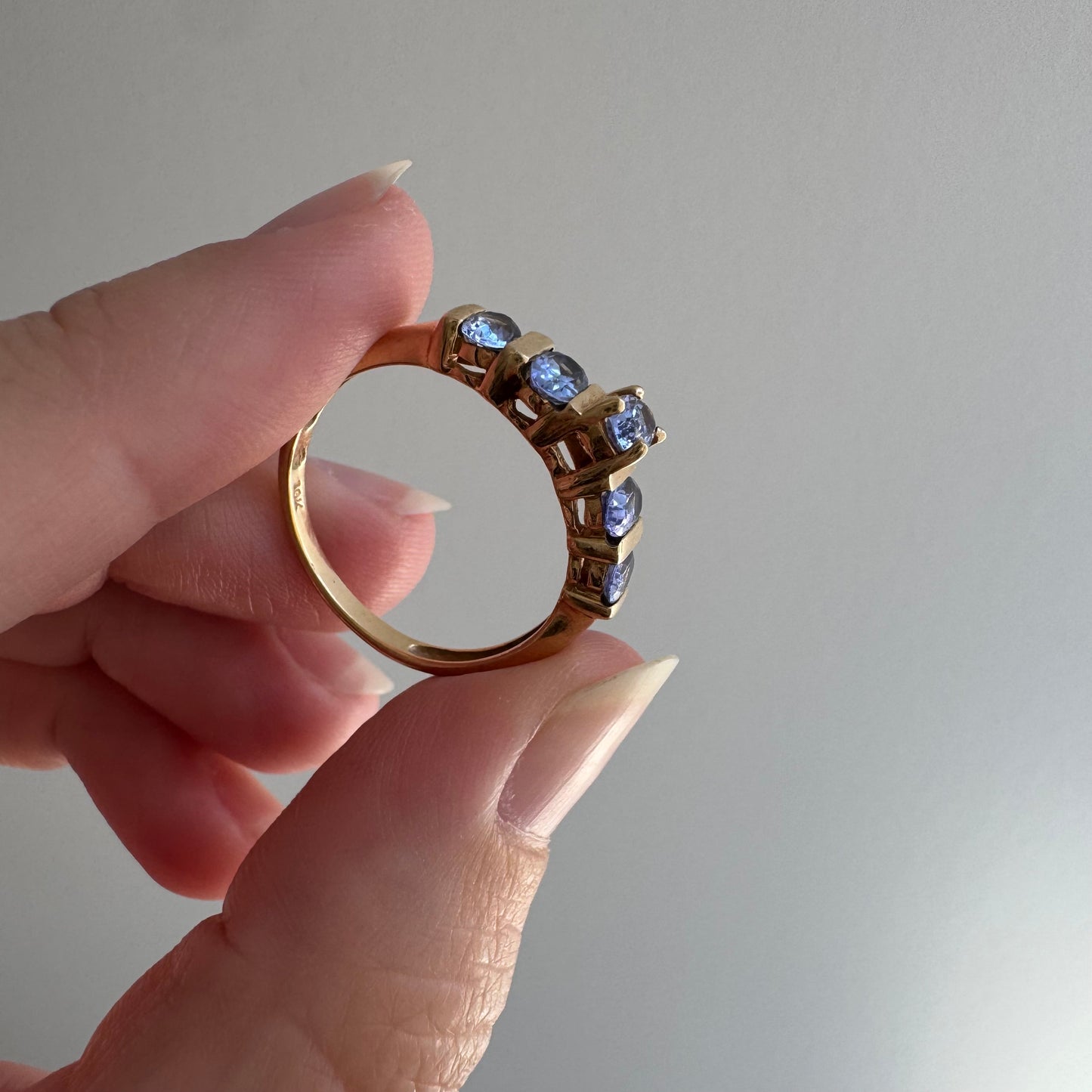 V I N T A G E // periwinkle row / 10k yellow gold and tanzanite half eternity band / size 8