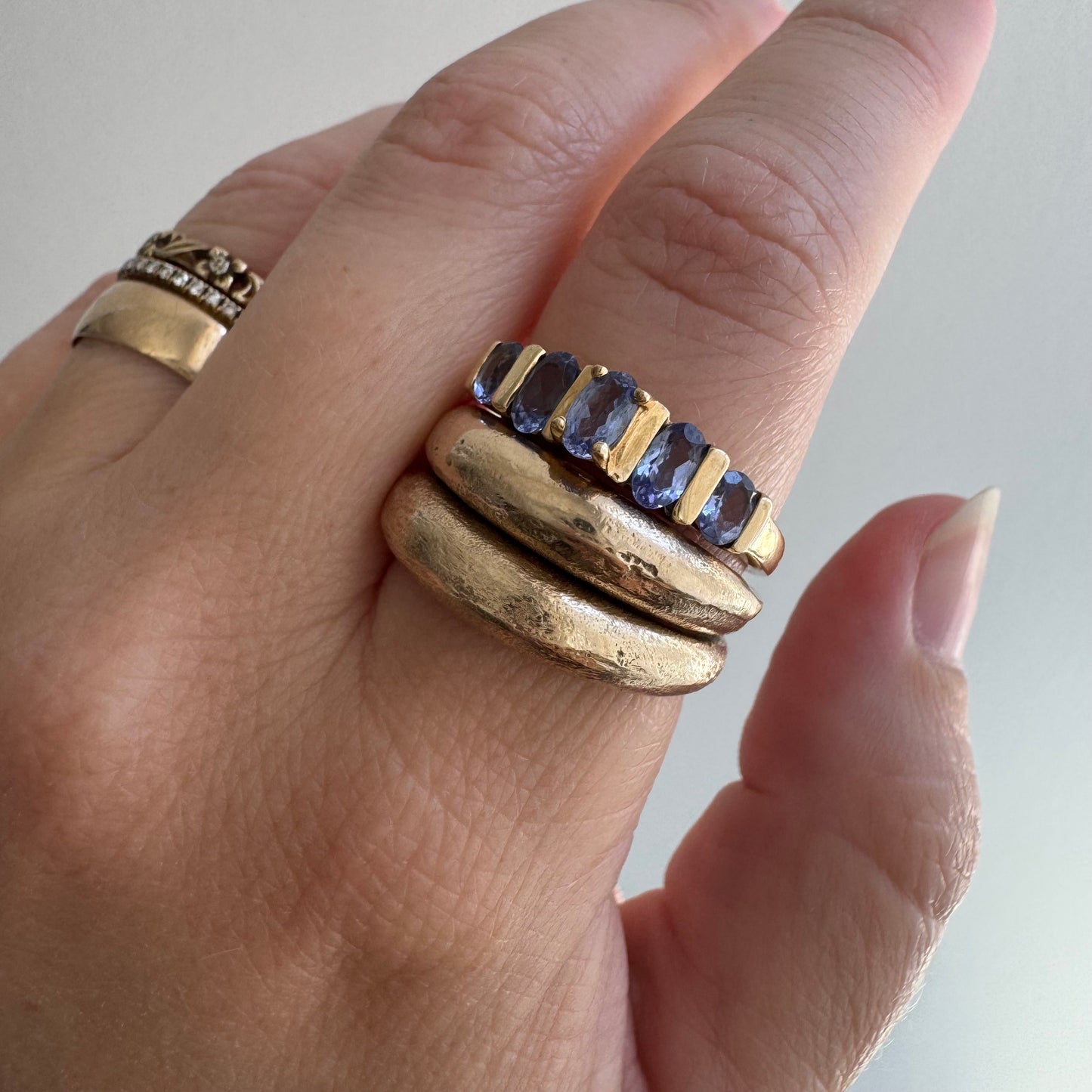 V I N T A G E // periwinkle row / 10k yellow gold and tanzanite half eternity band / size 8