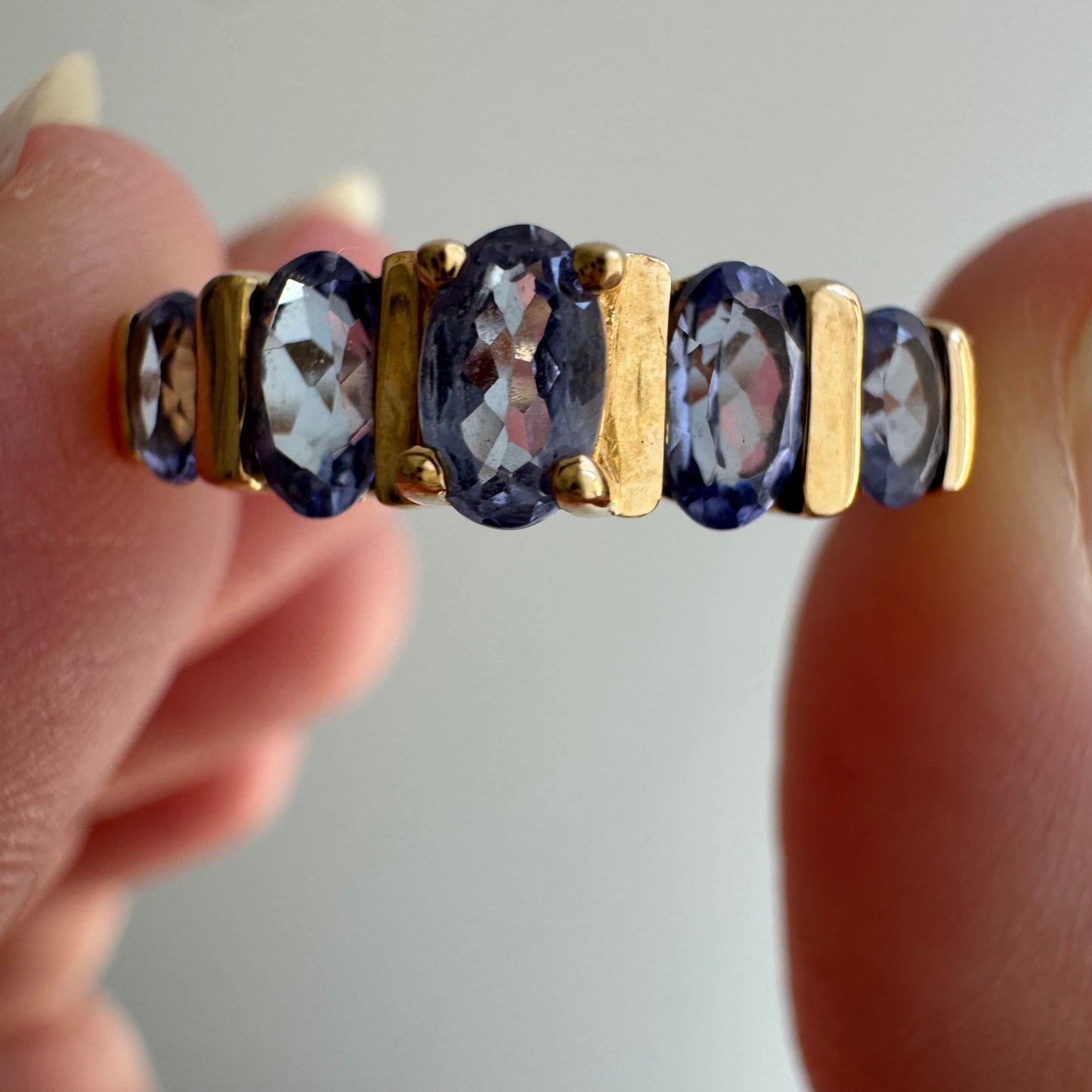V I N T A G E // periwinkle row / 10k yellow gold and tanzanite half eternity band / size 8