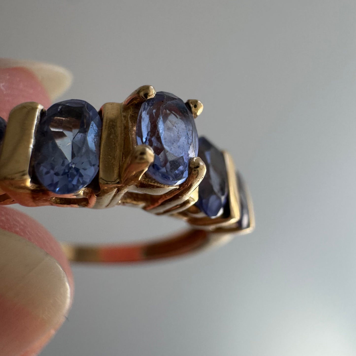 V I N T A G E // periwinkle row / 10k yellow gold and tanzanite half eternity band / size 8